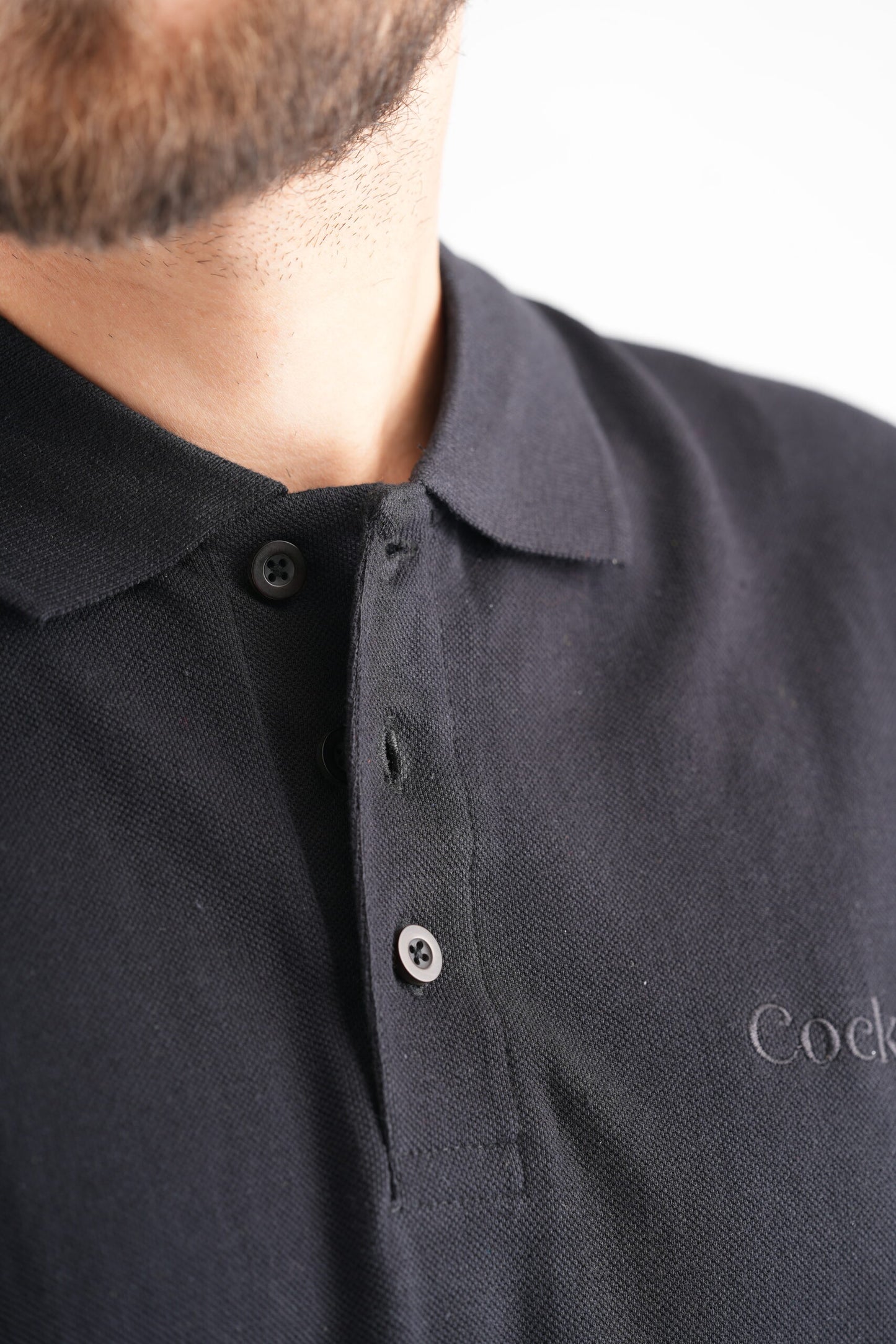 Black Polo T-Shirt – Classic Embroidered Detailing for a Refined Look